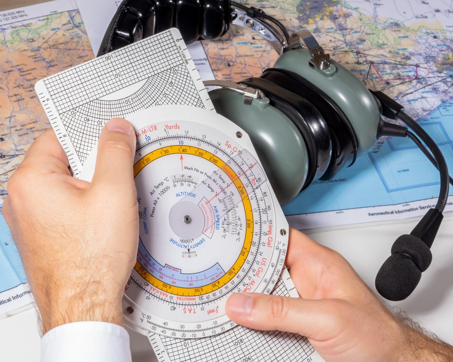 The pilot plans the flight, calculates the flight parameters, altitude, speed, fuel consumption of the aircraft. Airline pilot training concept.